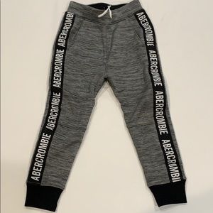 Gray sweats with Abercrombie going down sides.